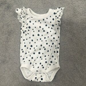 White with black polka dots onesie